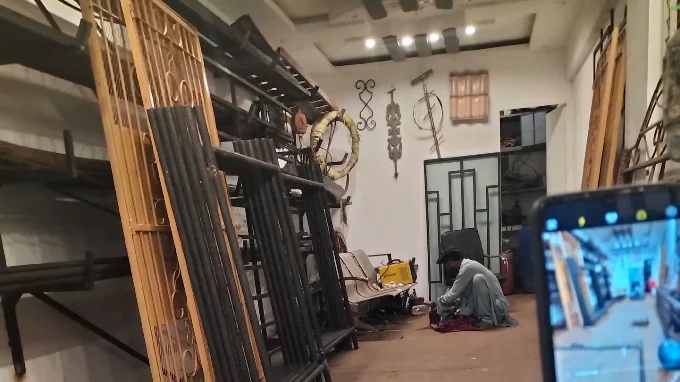 Custom iron gate fabrication by Al Razzaq Grill Works