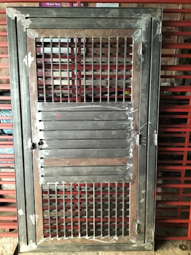 Custom steel grill door fabricated by Al Razzaq Grill Works